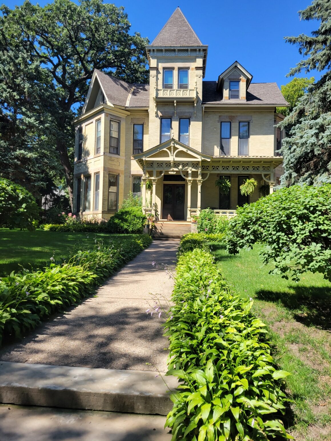 Yellow Victorian House on St. Paul's longest stretch of Victorian homes.